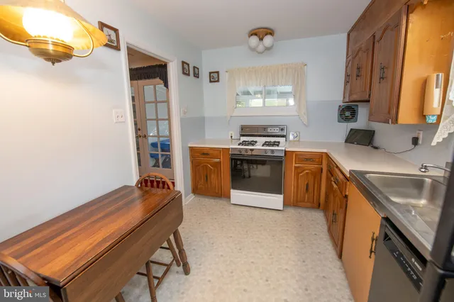 a kitchen with a stove and a microwave