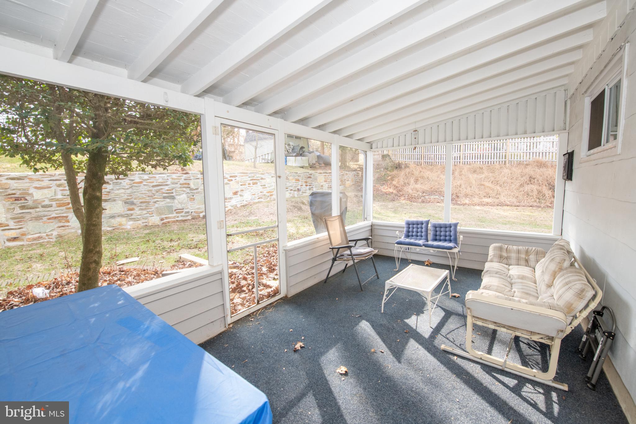 8810 Tyson Road Glenside, PA 19038 - Photo 47 of 53 a living room with furniture and a large window