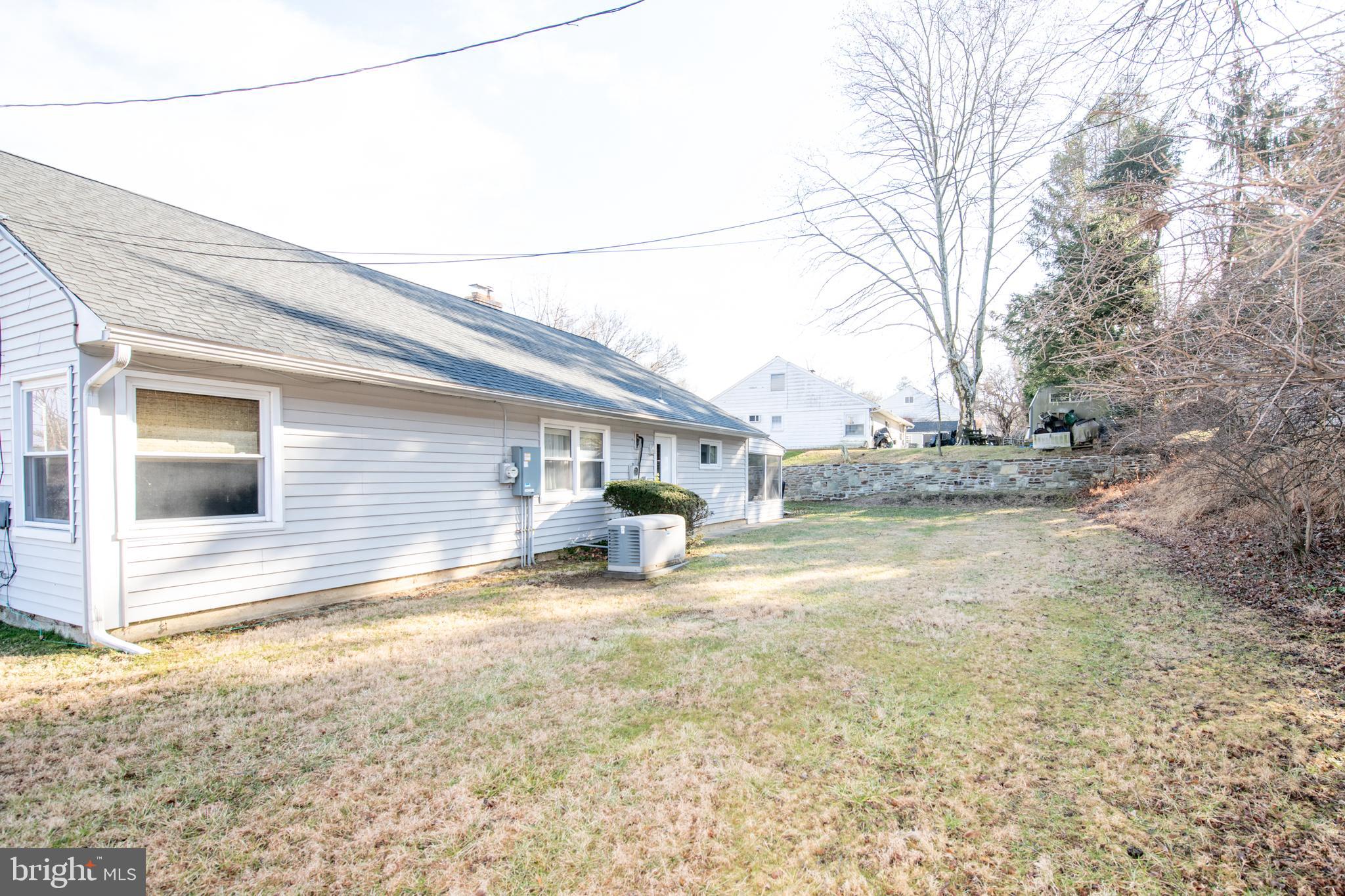 8810 Tyson Road Glenside, PA 19038 - Photo 10 of 53 a view of a house with a patio