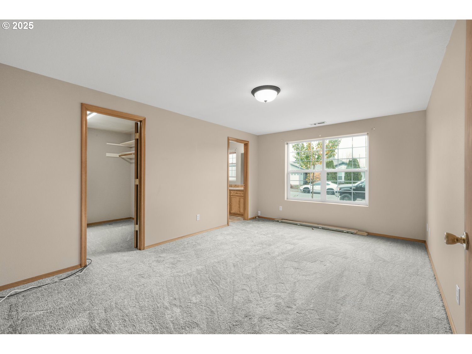 52269 Southeast Tyler Street Scappoose, OR 97056 - Photo 11 of 21 a view of an empty room with a window
