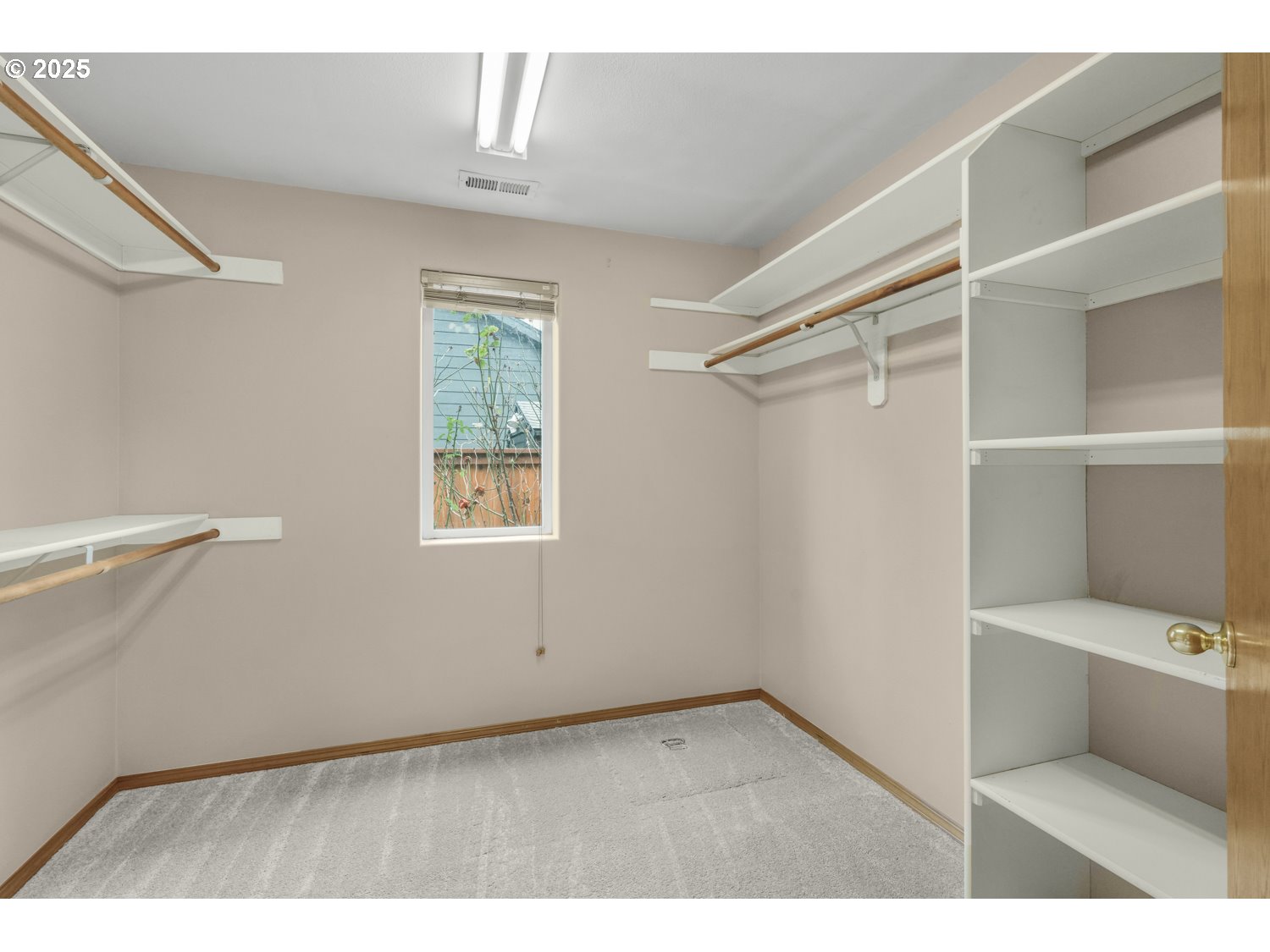 52269 Southeast Tyler Street Scappoose, OR 97056 - Photo 14 of 21 a bathroom with a window and a shower