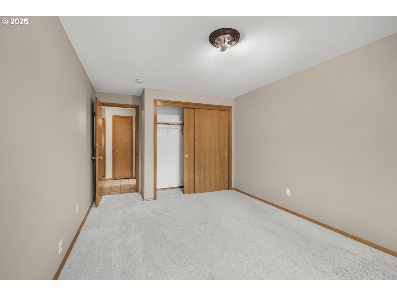 52269 Southeast Tyler Street Scappoose, OR 97056 - Photo 18 of 21 a view of an empty room with a window