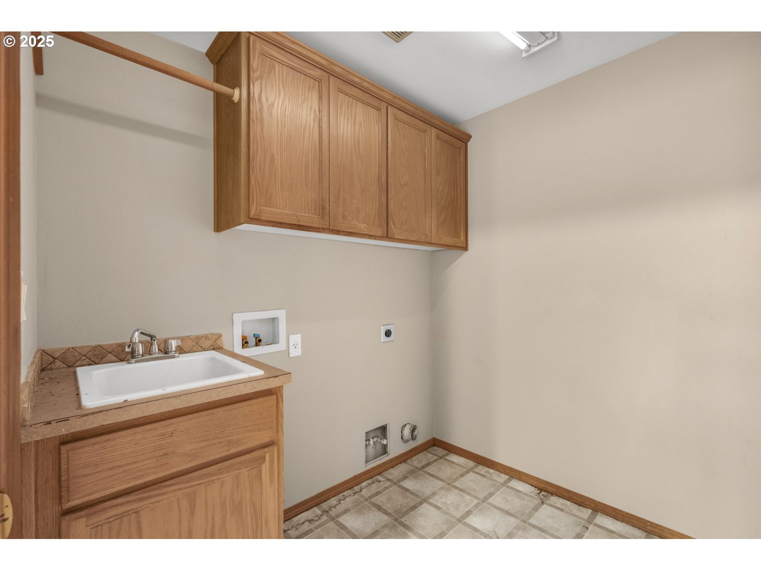52269 Southeast Tyler Street Scappoose, OR 97056 - Photo 20 of 21 a bathroom with a sink and a mirror