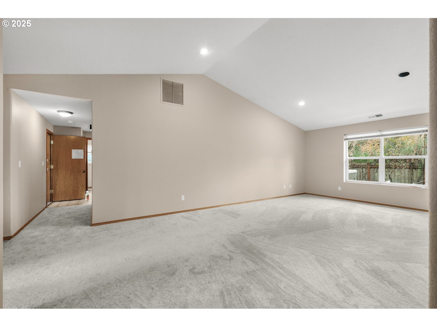 52269 Southeast Tyler Street Scappoose, OR 97056 - Photo 2 of 21 a view of an empty room with a window