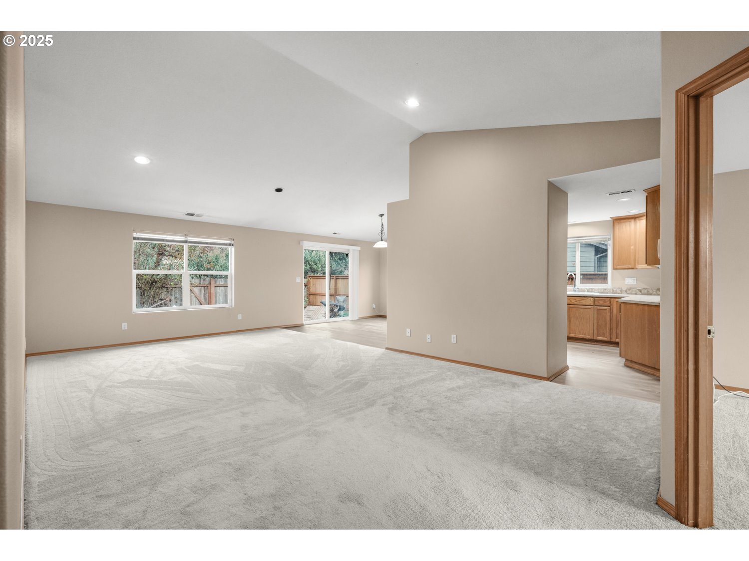 52269 Southeast Tyler Street Scappoose, OR 97056 - Photo 4 of 21 a view of an empty room with a window