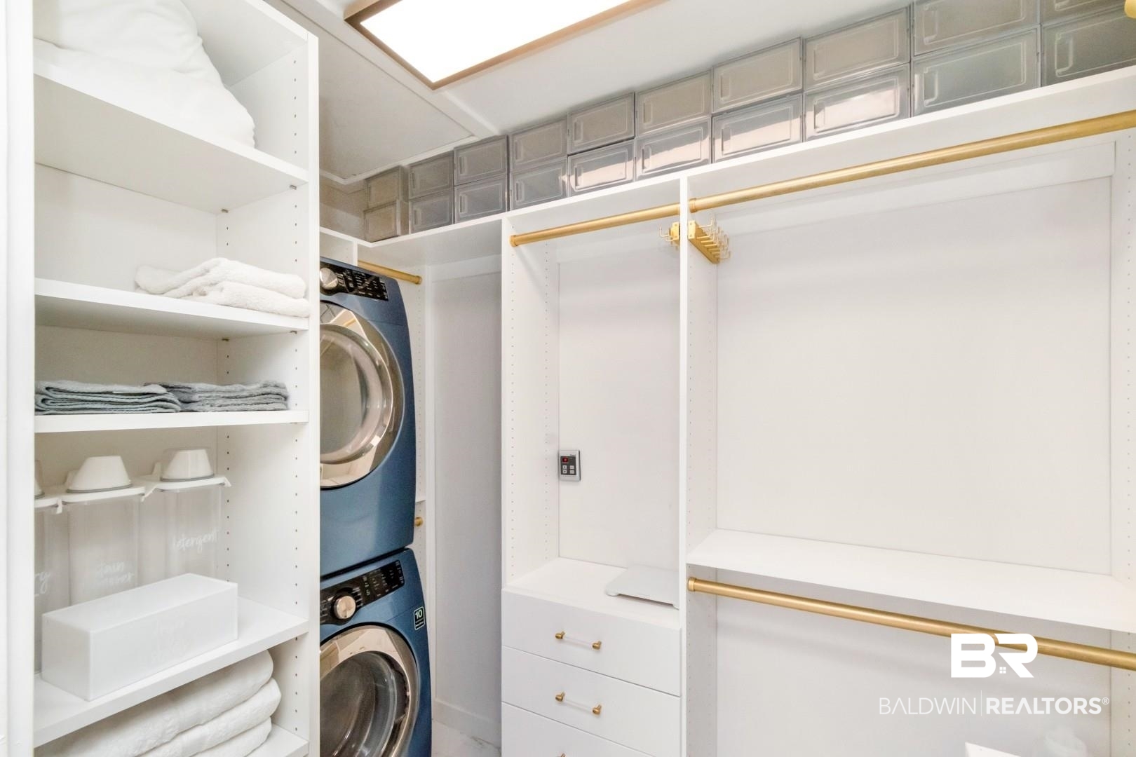 18 Princess Anne Road Mobile, AL 36608 - Photo 20 of 41 Walk in closet with stacked washer and clothes dryer