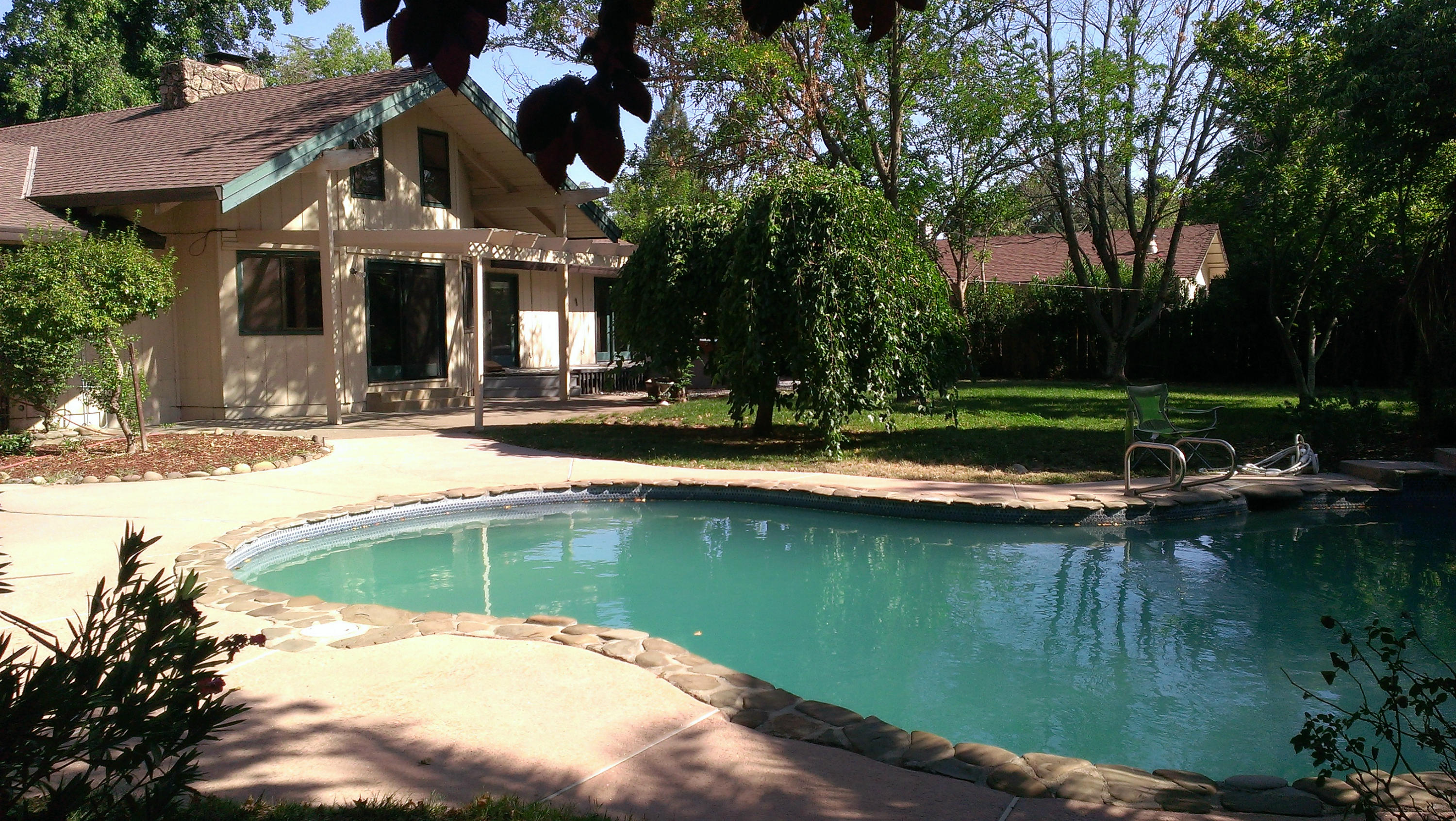 6266 Riverside Drive Redding, CA 96001 - Photo 3 of 14 Back of house/pool