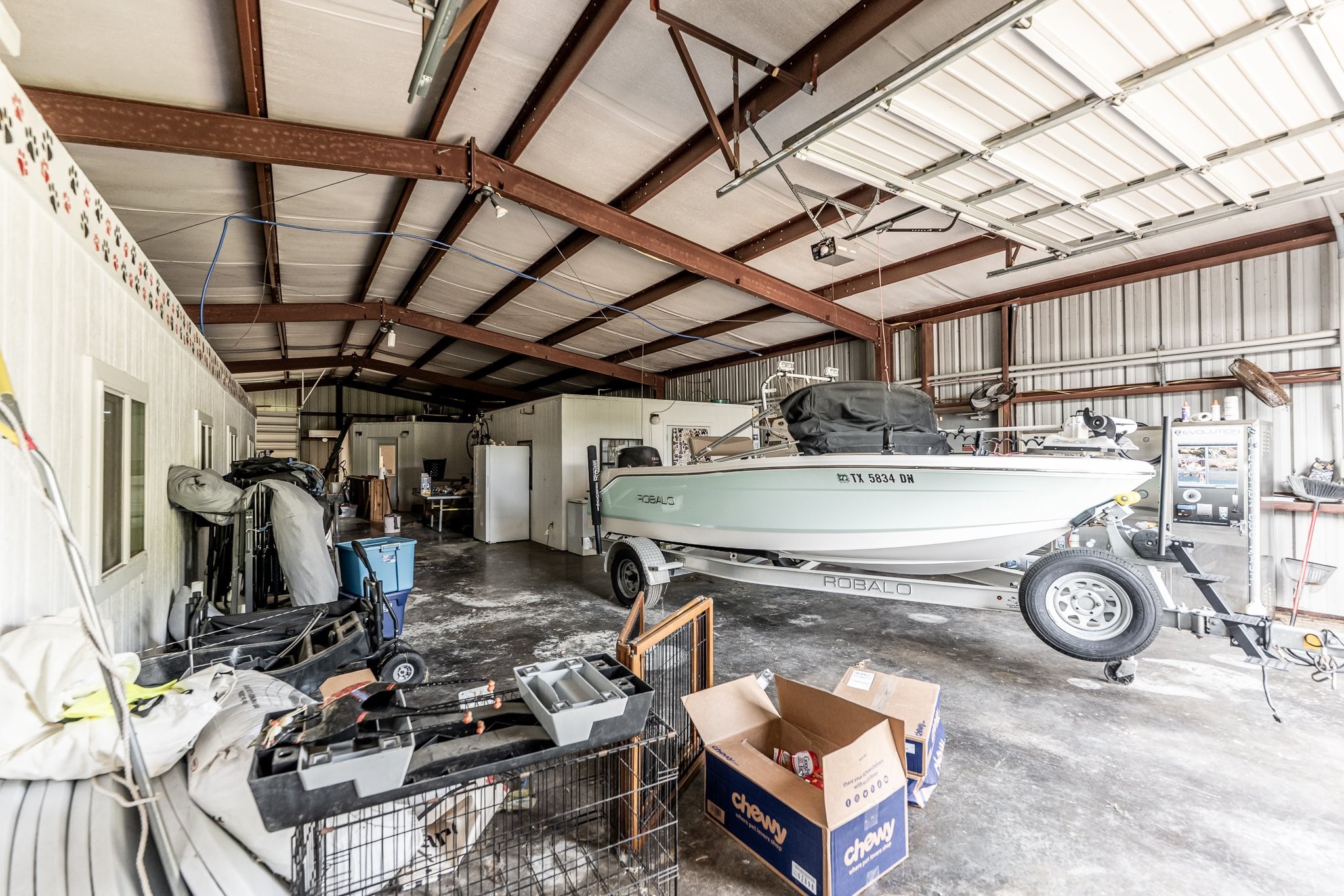 9010 Point Barrow Road Beach City, TX 77523 - Photo 36 of 50 The 40'×80' building delivers substantial enclosed square footage with room for vehicles, equipment, storage & large-scale use, making it one of the property’s most versatile improvements.