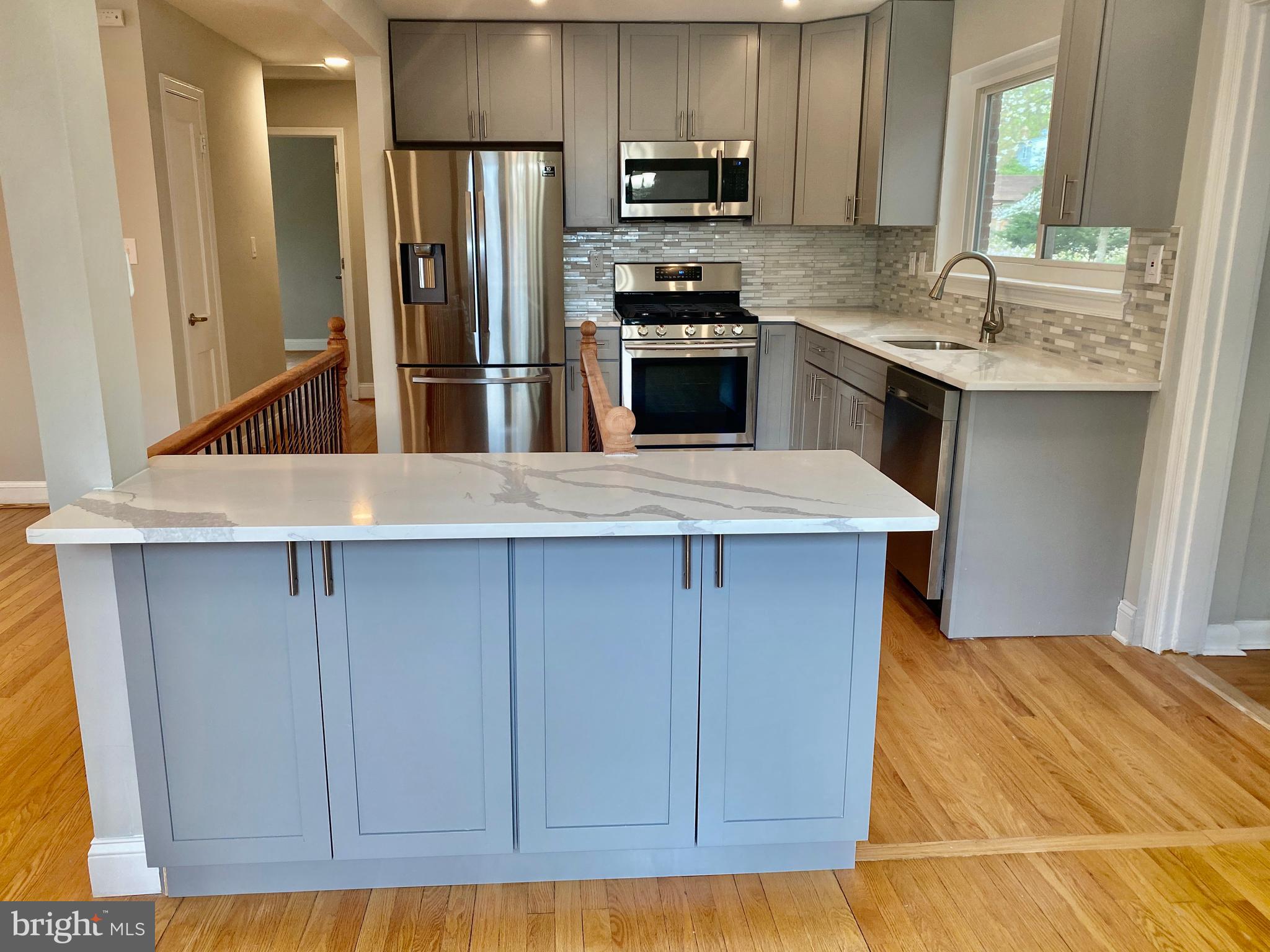 10007 Portland Road Silver Spring, MD 20901 - Photo 12 of 41 NEW ISLAND WITH CABINET STORAGE