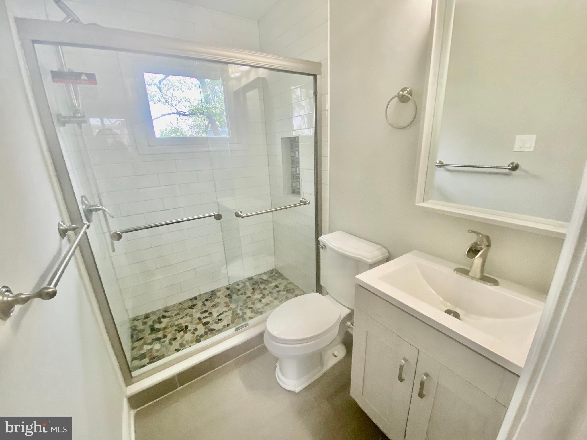 10007 Portland Road Silver Spring, MD 20901 - Photo 17 of 41 NEW FULL BATHROOM OFF KITCHEN