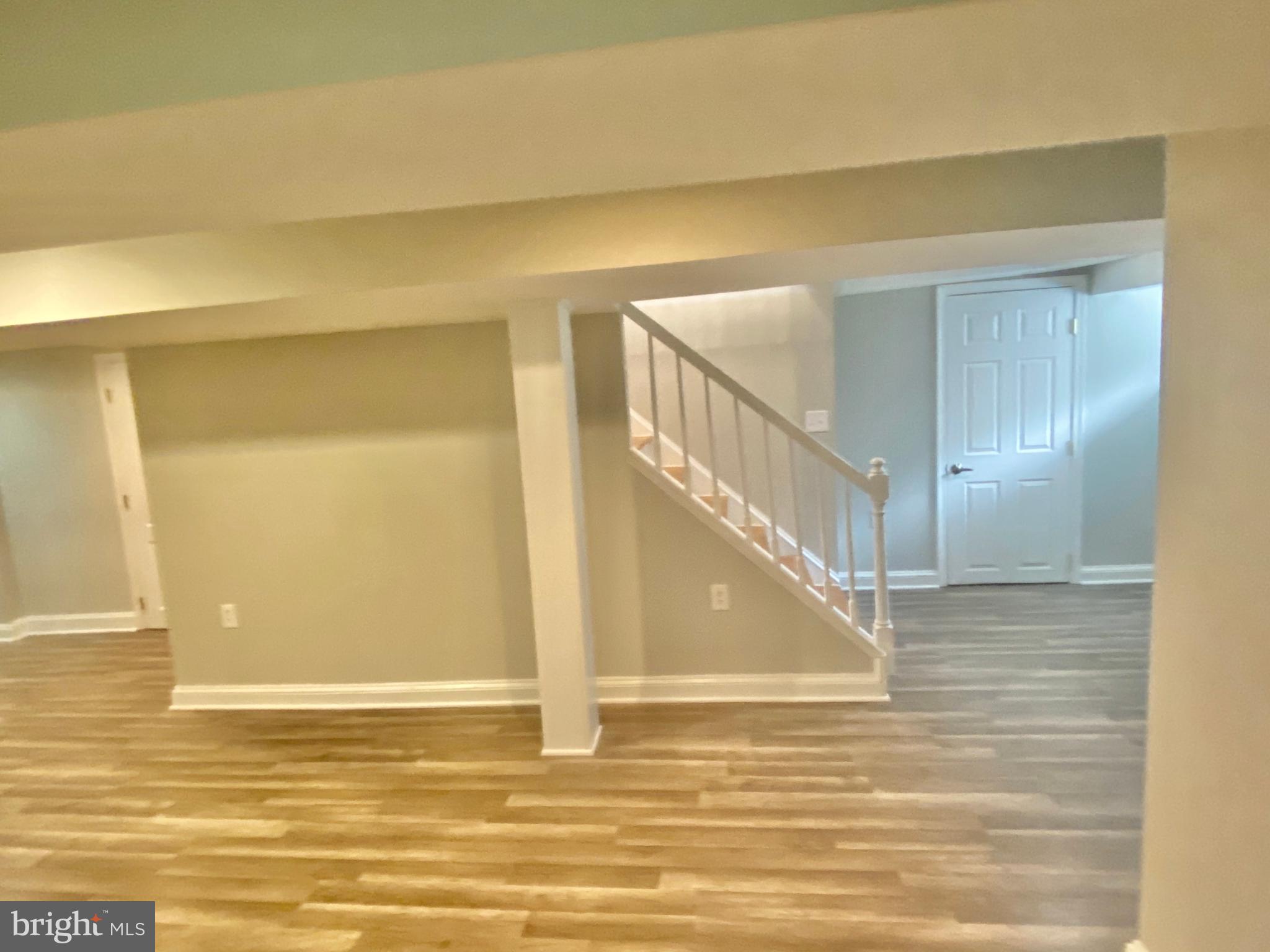 10007 Portland Road Silver Spring, MD 20901 - Photo 27 of 41 NEW BASEMENT FLOORS AND RECESSED LIGHTING