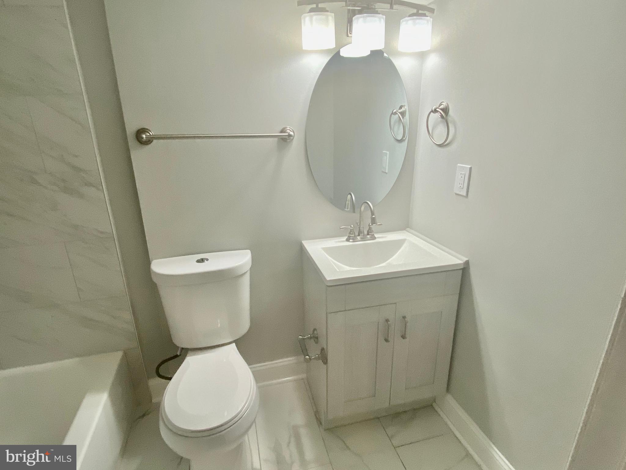 10007 Portland Road Silver Spring, MD 20901 - Photo 31 of 41 NEW VANITY AND TILE FLOORING
