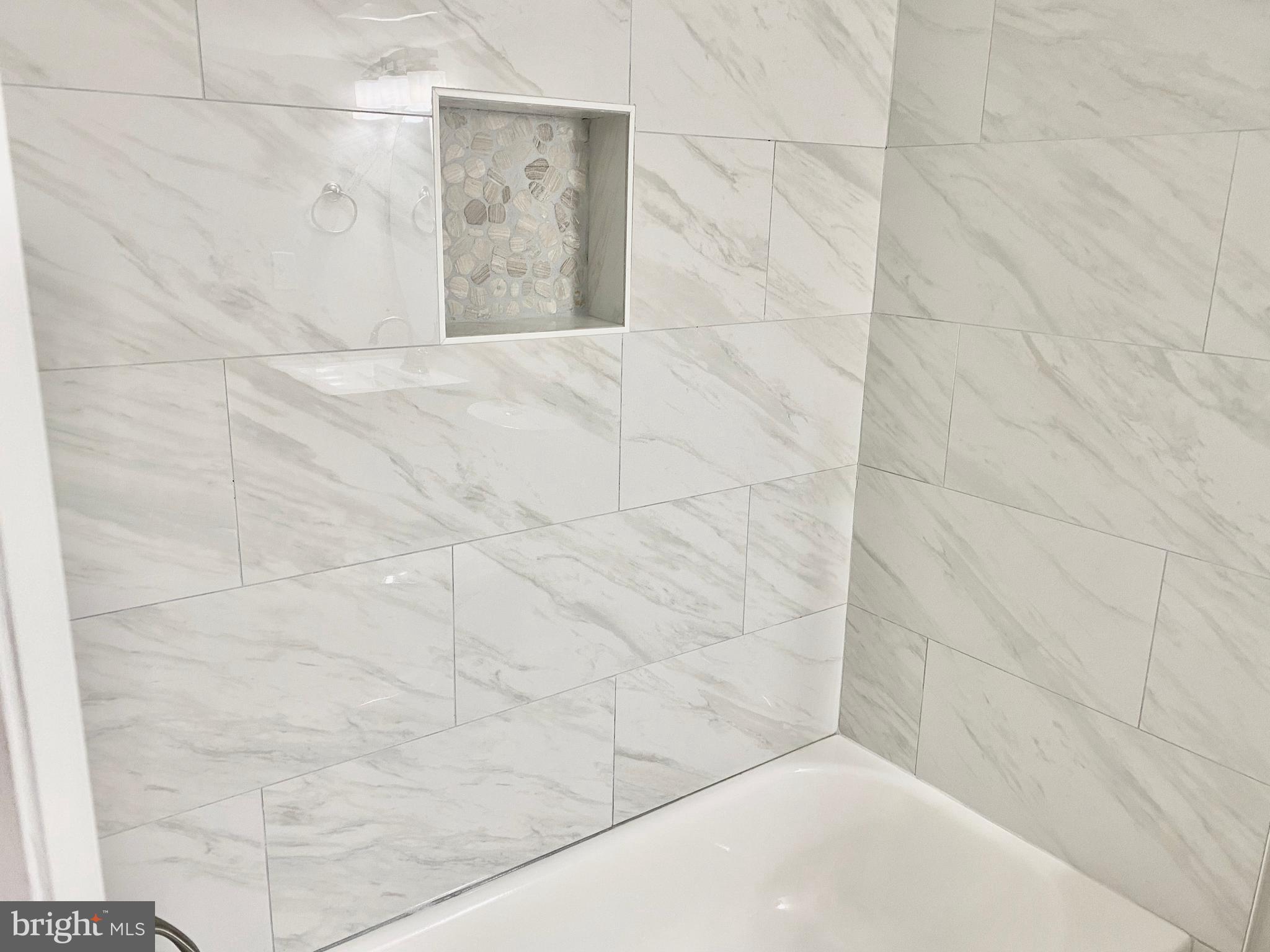 10007 Portland Road Silver Spring, MD 20901 - Photo 32 of 41 VIEW OF NEW BATH TILE