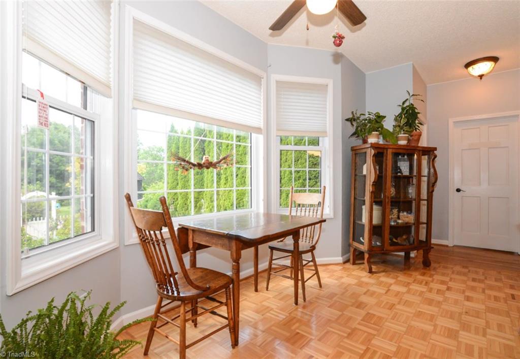 1141 Winding Ridge Road Walnut Cove, NC 27052 - Photo 11 of 30 Breakfast area overlooking garden with fountain.