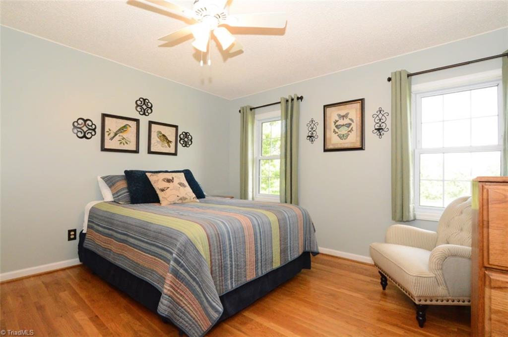 1141 Winding Ridge Road Walnut Cove, NC 27052 - Photo 16 of 30 Comfortable bedroom 2 with great views and lots of natural light.