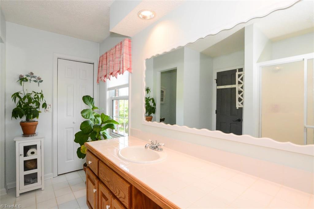 1141 Winding Ridge Road Walnut Cove, NC 27052 - Photo 18 of 30 Upstairs master bath is light and bright.