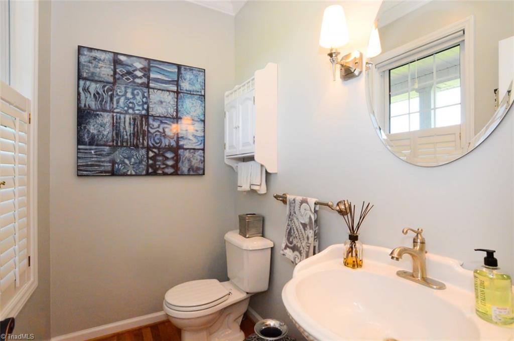 1141 Winding Ridge Road Walnut Cove, NC 27052 - Photo 21 of 30 Downstairs powder room is updated and easy to access by guests.