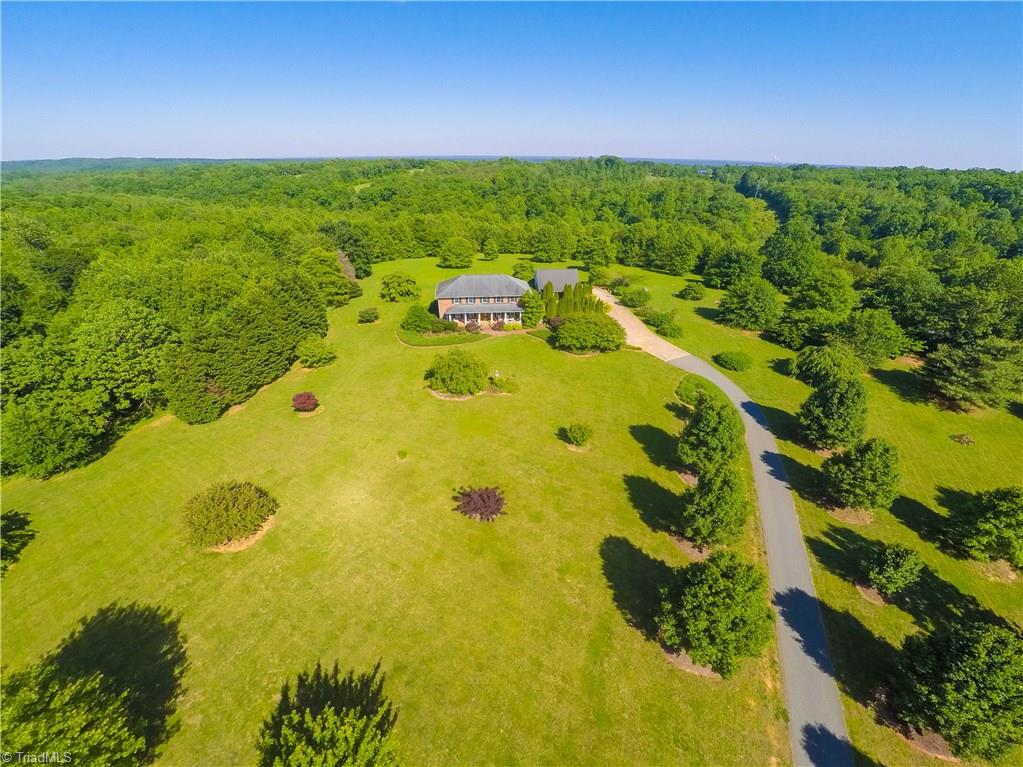 1141 Winding Ridge Road Walnut Cove, NC 27052 - Photo 30 of 30 Glorious view of the home and yard, and the surrounding acreage. You can not get any more beautiful than this!