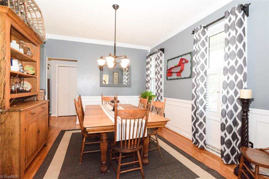 1141 Winding Ridge Road Walnut Cove, NC 27052 - Photo 7 of 30 Warm dining room is located to the right of the foyer entrance.