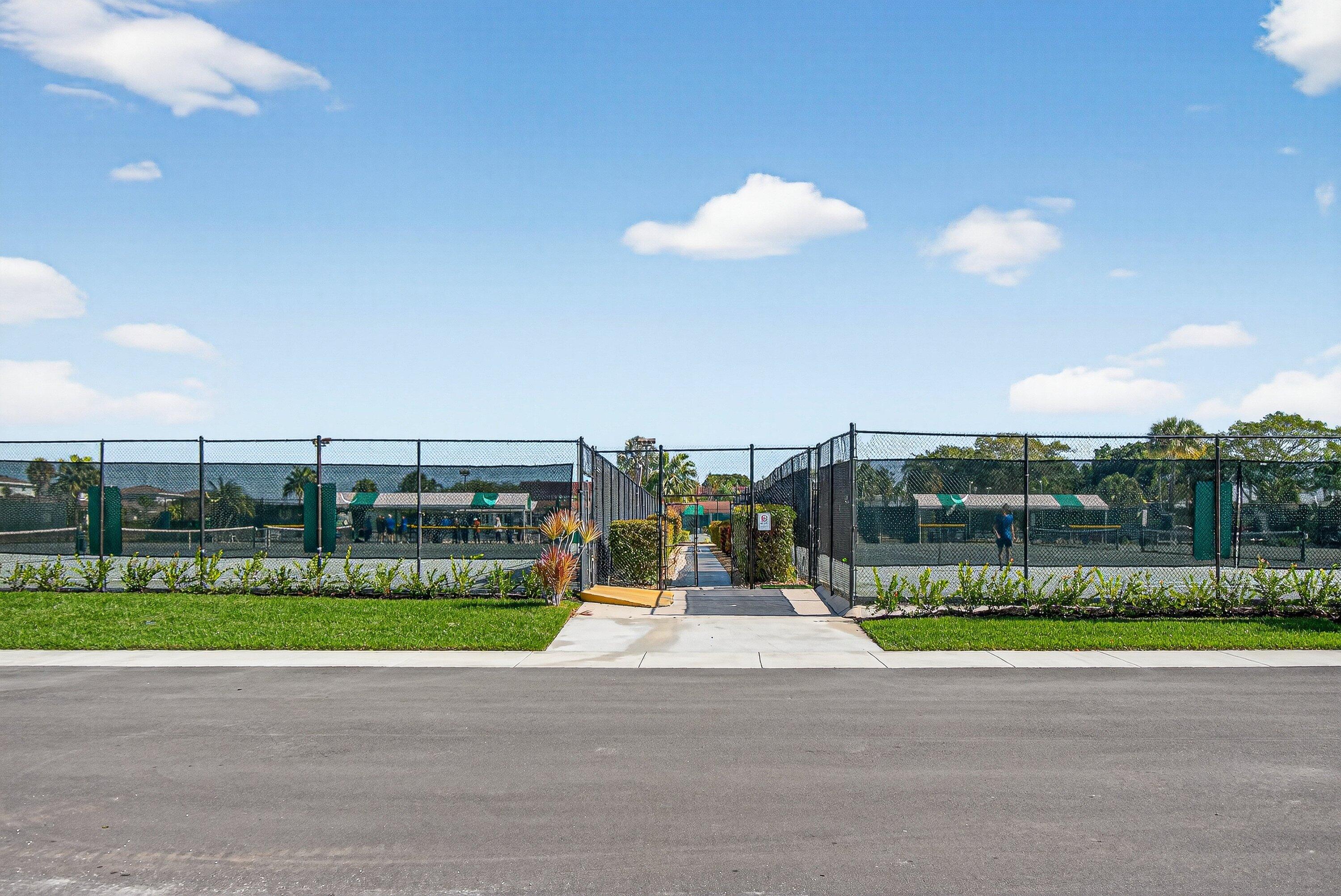 13465 Fishtail Palm Court, Unit D Delray Beach, FL 33484 - Photo 29 of 29 a view of a yard