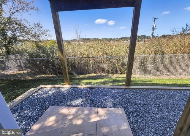 a view of a yard with a car