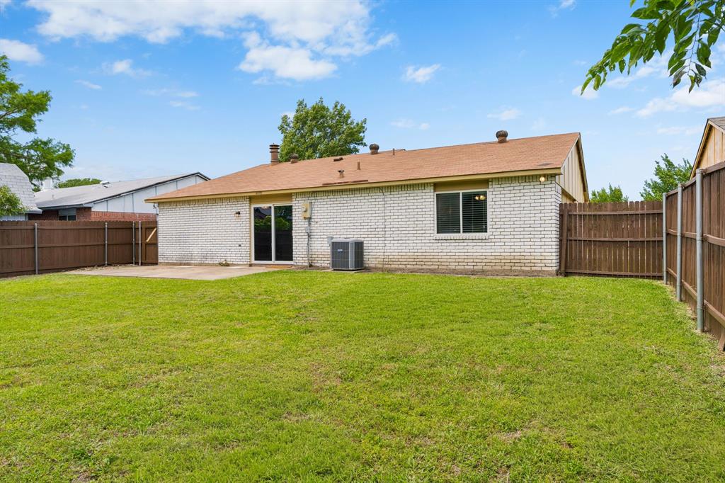 5620 Perrin Street The Colony, TX 75056 - Photo 22 of 31 a front view of house with a garden