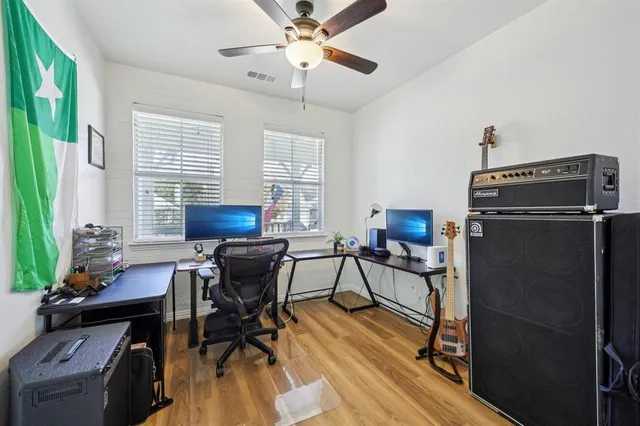 a view of a workspace with furniture and a livingroom