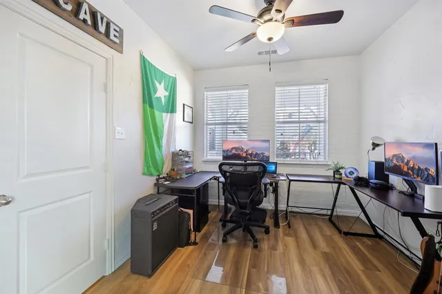 a workspace with wooden floor