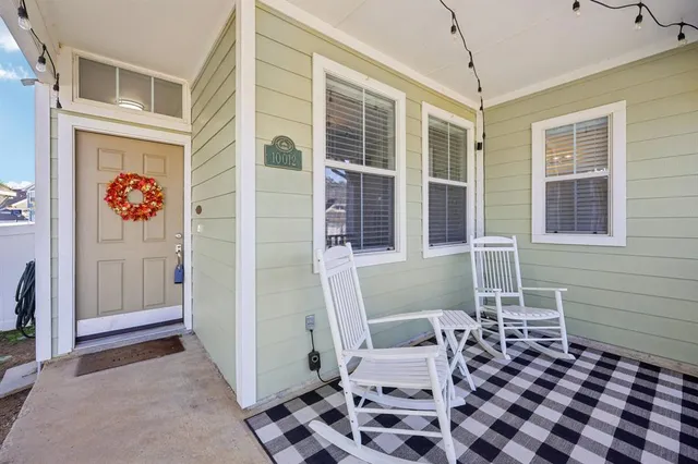 a view of a entryway with furniture and front door