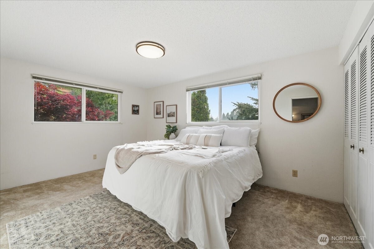 309 West Walnut Street Waterville, WA 98858 - Photo 10 of 28 a bedroom with bed and a window