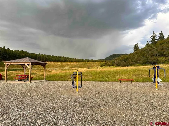 a view of a lake with a yard
