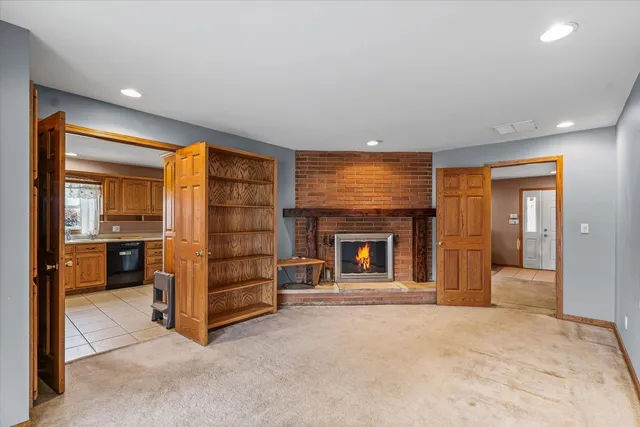 a view of a livingroom with a fireplace