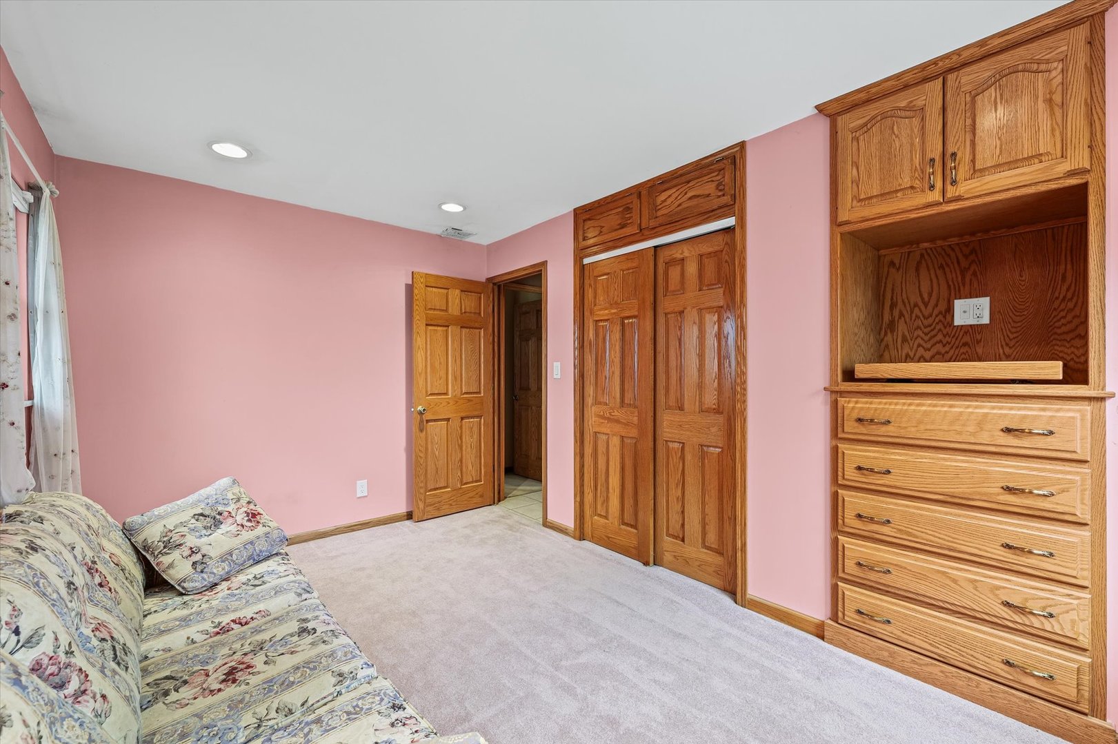 2801 West William Street Champaign, IL 61821 - Photo 20 of 30 a bedroom with a bed and cabinets