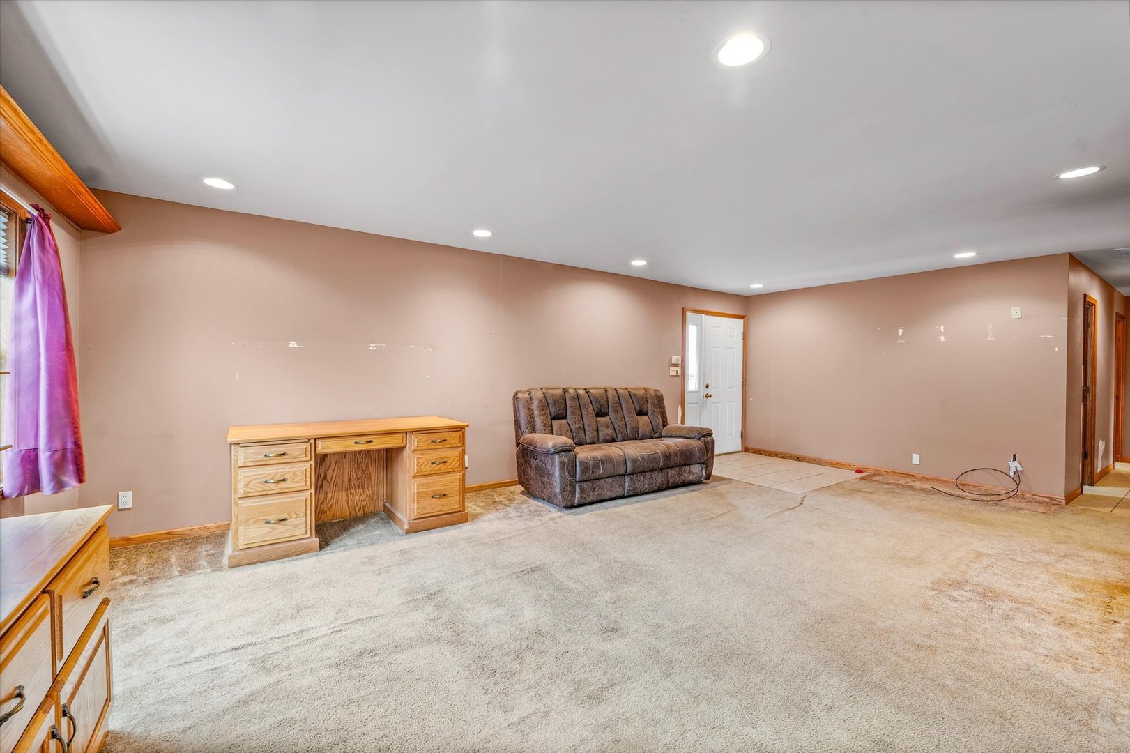 2801 West William Street Champaign, IL 61821 - Photo 5 of 30 a view of a livingroom with furniture and natural light