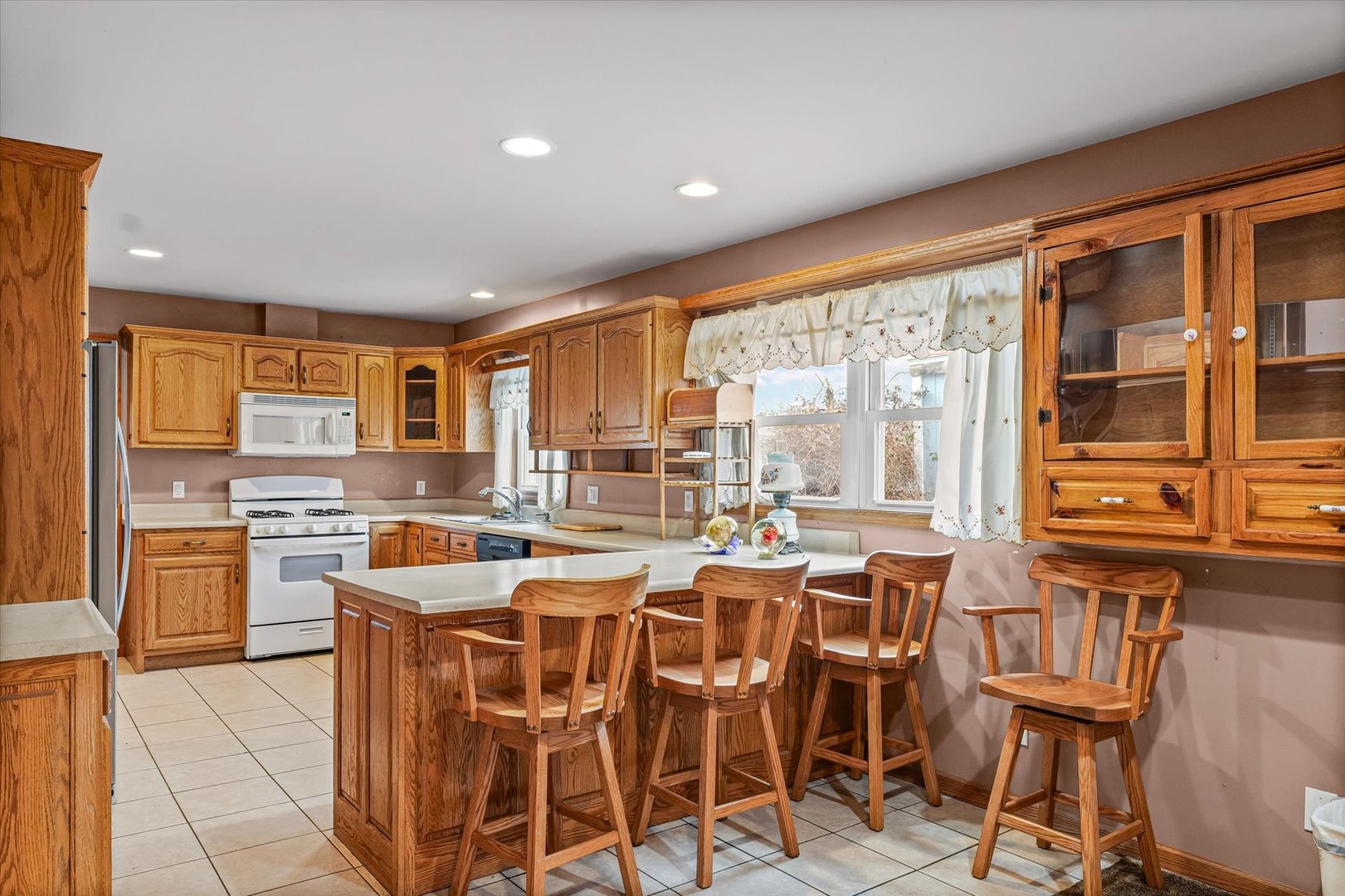 2801 West William Street Champaign, IL 61821 - Photo 7 of 30 a large kitchen with a table and chairs