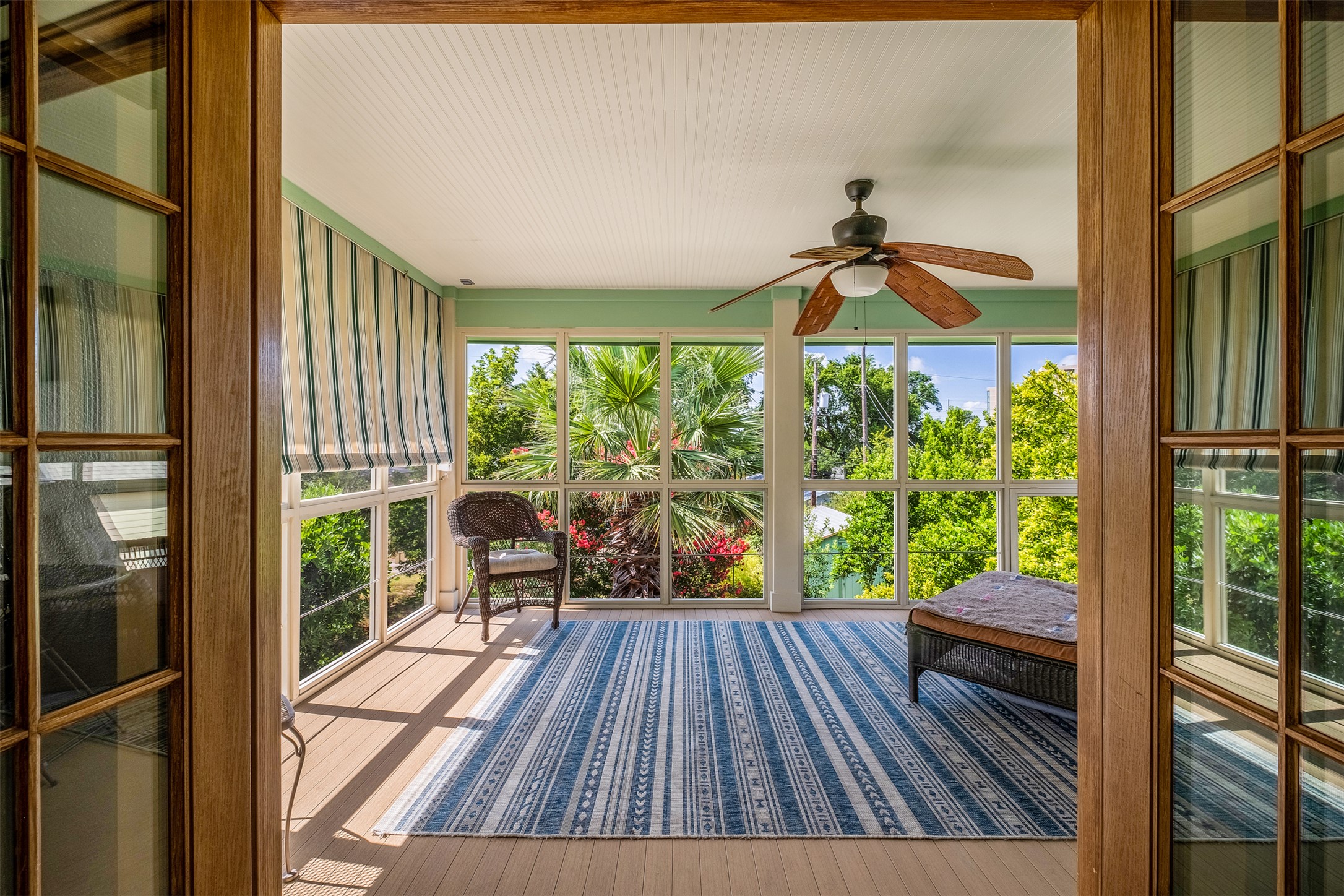 903 East 14th Street Austin, TX 78702 - Photo 16 of 31 Stunning screened porch through French doors in the primary bedroom