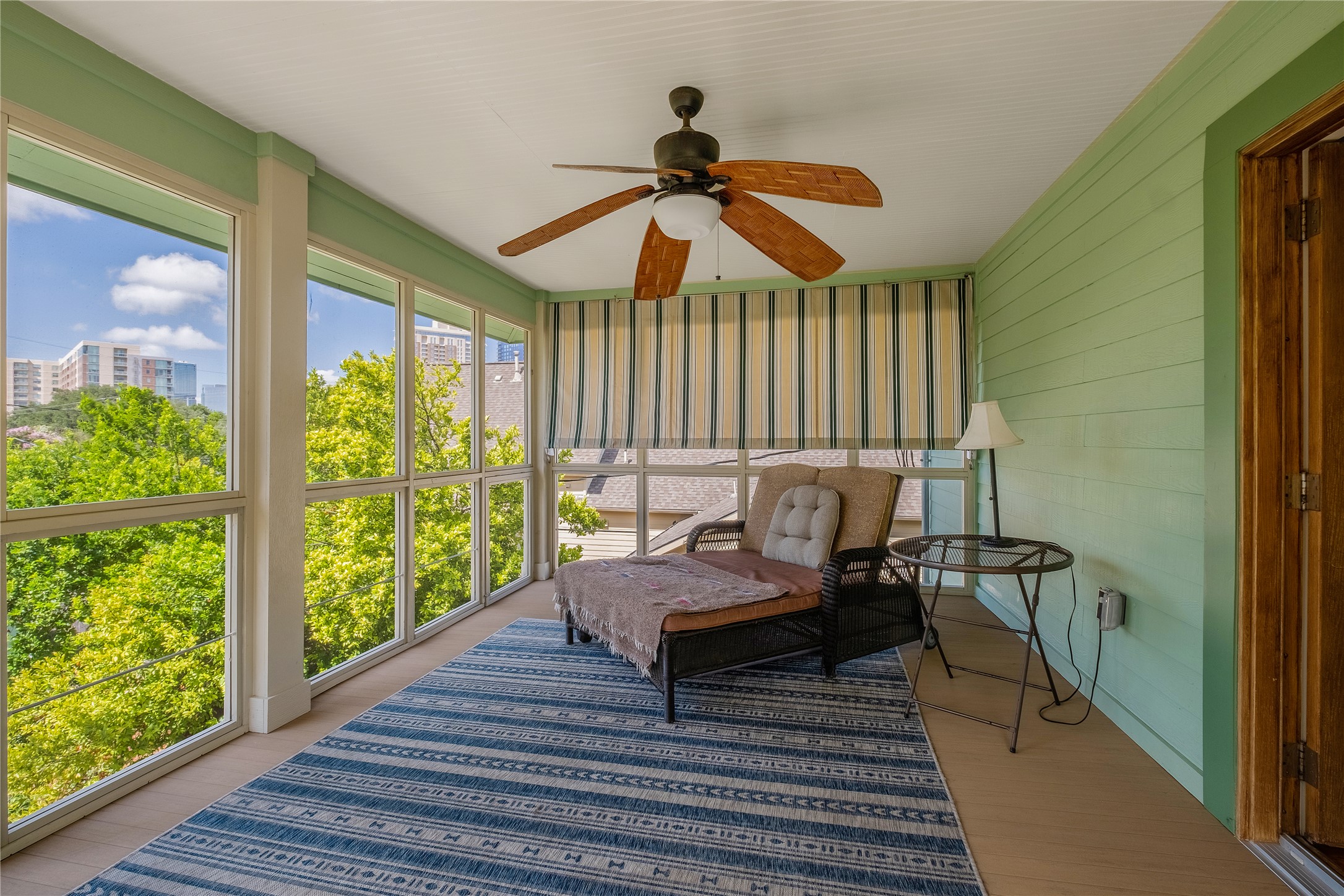 903 East 14th Street Austin, TX 78702 - Photo 17 of 31 Upper screened porch, situated just off the primary bedroom