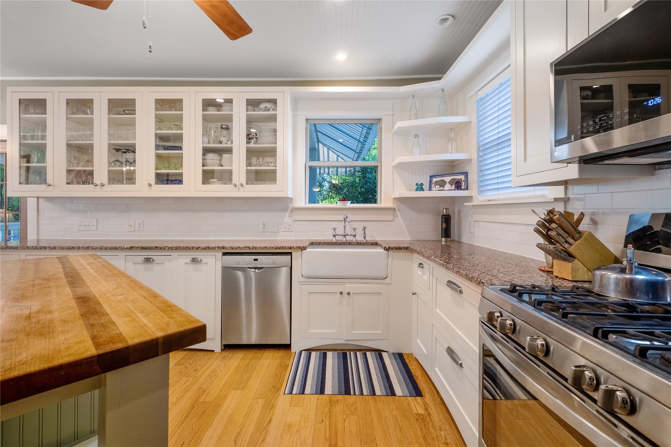 903 East 14th Street Austin, TX 78702 - Photo 8 of 31 Bright, airy kitchen with custom cabinetry