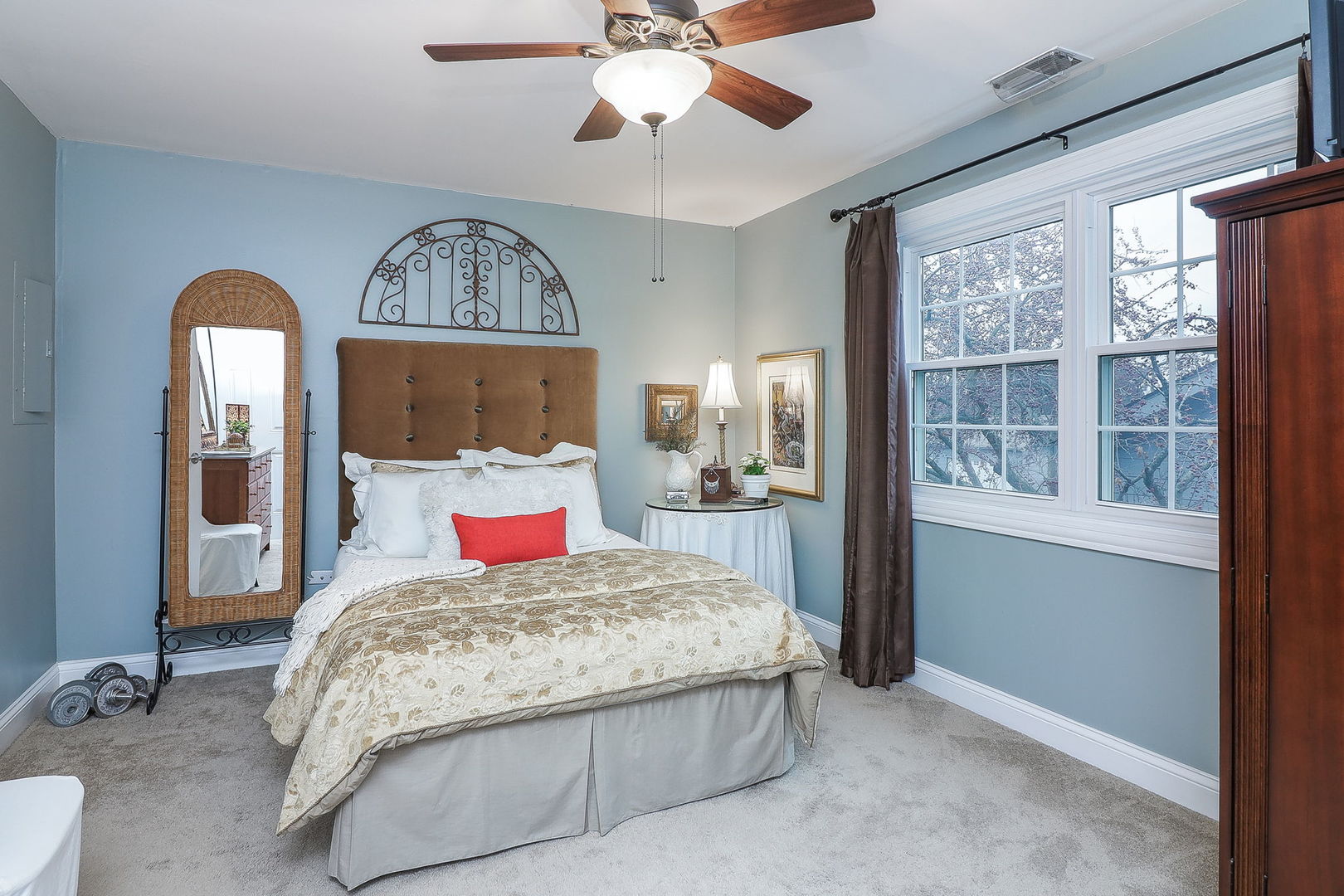 43 Foxcroft Road, Unit 203 Naperville, IL 60565 - Photo 12 of 19 a bedroom with a large bed and a chandelier