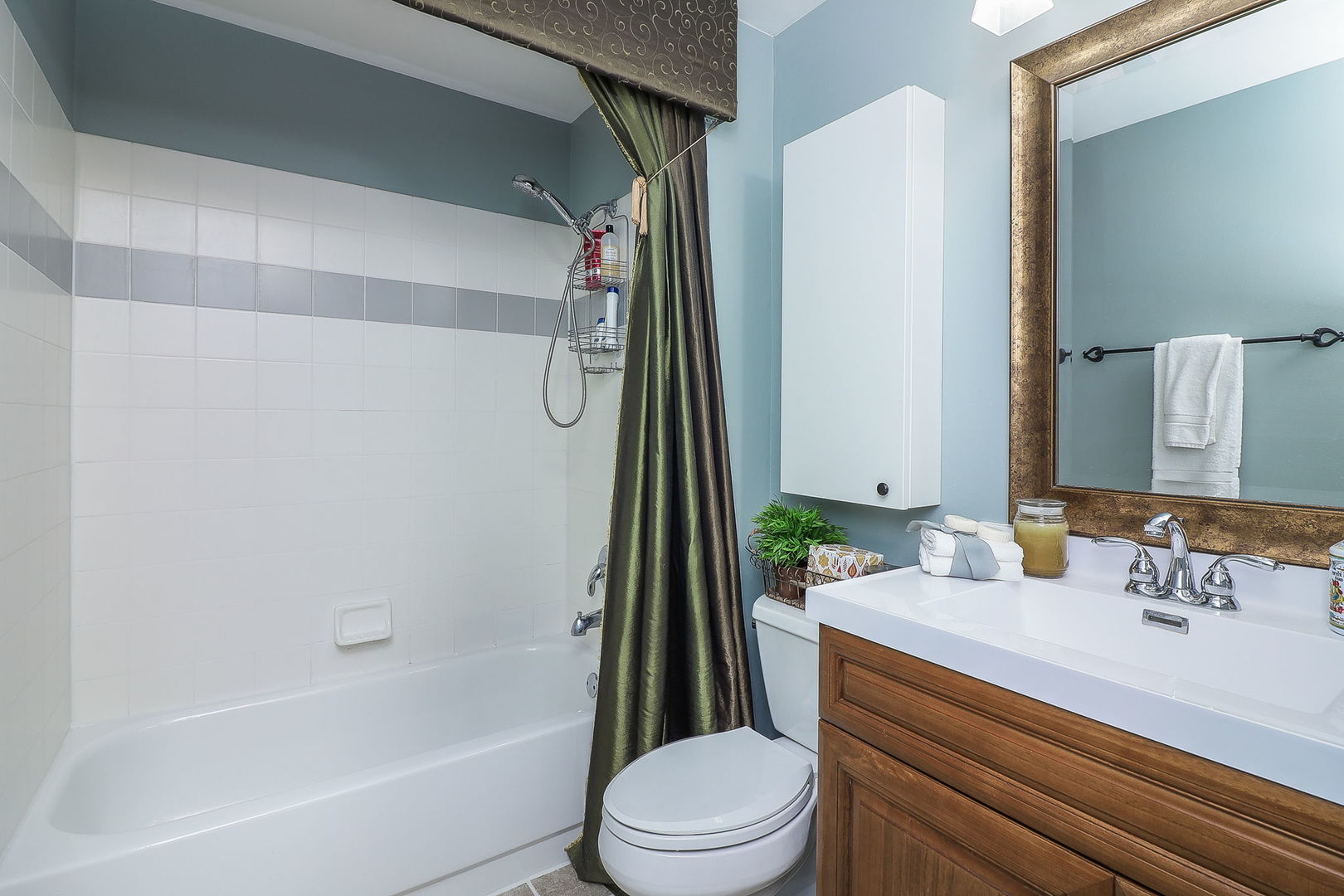 43 Foxcroft Road, Unit 203 Naperville, IL 60565 - Photo 14 of 19 a bathroom with a sink a toilet and shower