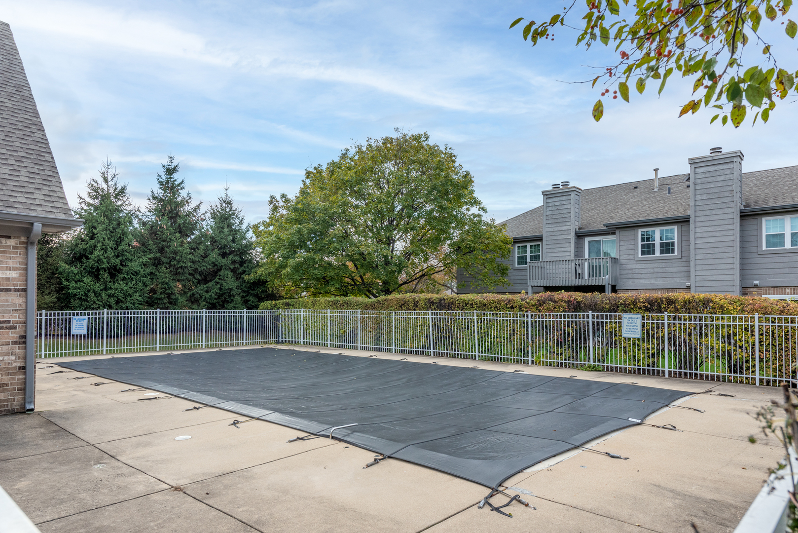 43 Foxcroft Road, Unit 203 Naperville, IL 60565 - Photo 18 of 19 a view of a terrace with a garden