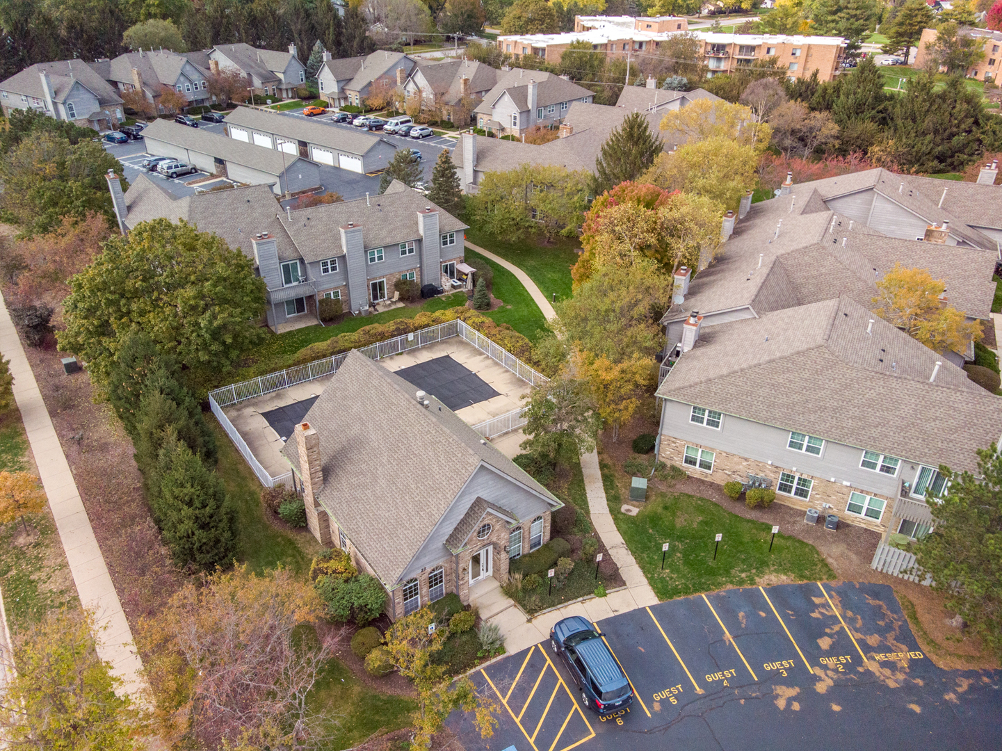 43 Foxcroft Road, Unit 203 Naperville, IL 60565 - Photo 19 of 19 an aerial view of residential houses with outdoor space
