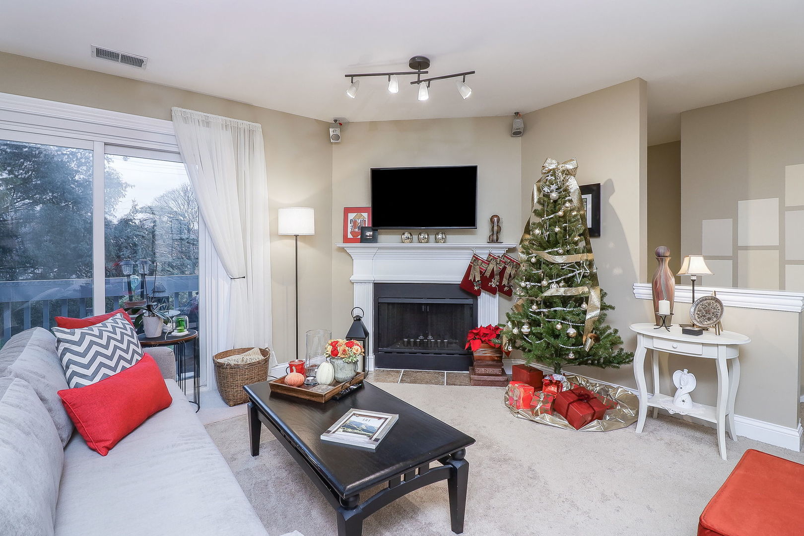 43 Foxcroft Road, Unit 203 Naperville, IL 60565 - Photo 3 of 19 a living room with furniture a flat screen tv and a fireplace