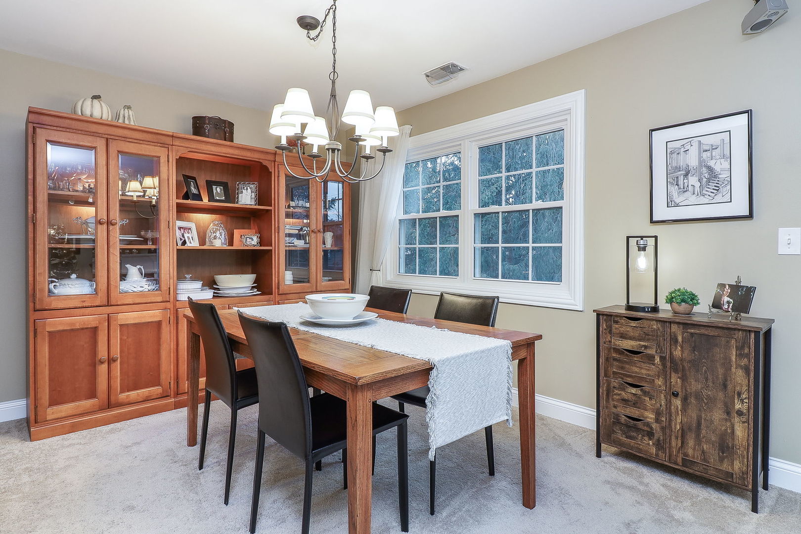 43 Foxcroft Road, Unit 203 Naperville, IL 60565 - Photo 7 of 19 a dining room with furniture a chandelier and window