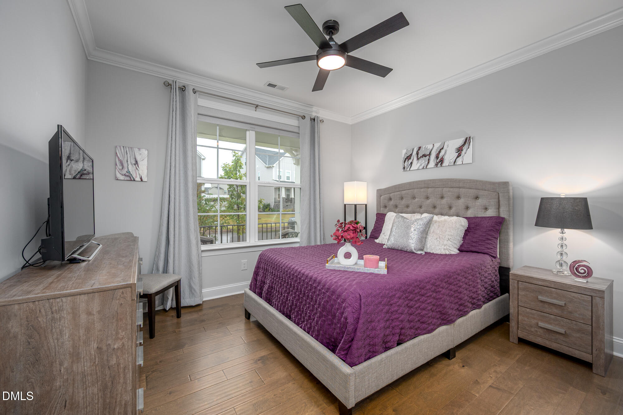 319 High Woods Ridge Chapel Hill, NC 27517 - Photo 11 of 71 a bedroom with a bed and a flat screen tv