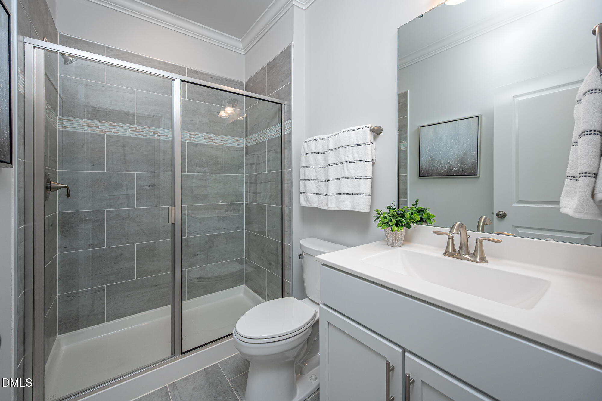 319 High Woods Ridge Chapel Hill, NC 27517 - Photo 12 of 71 a bathroom with a sink a toilet and shower
