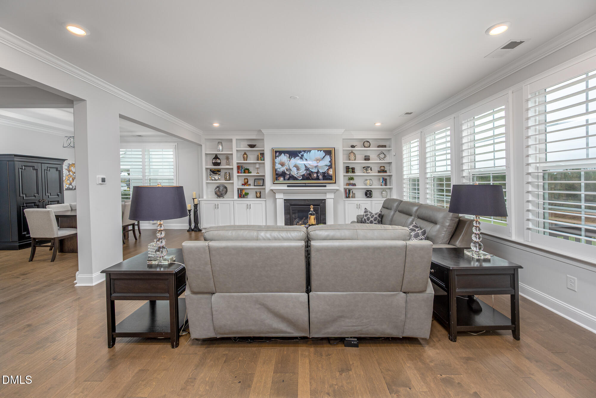 319 High Woods Ridge Chapel Hill, NC 27517 - Photo 14 of 71 a living room with furniture a fireplace and a flat screen tv