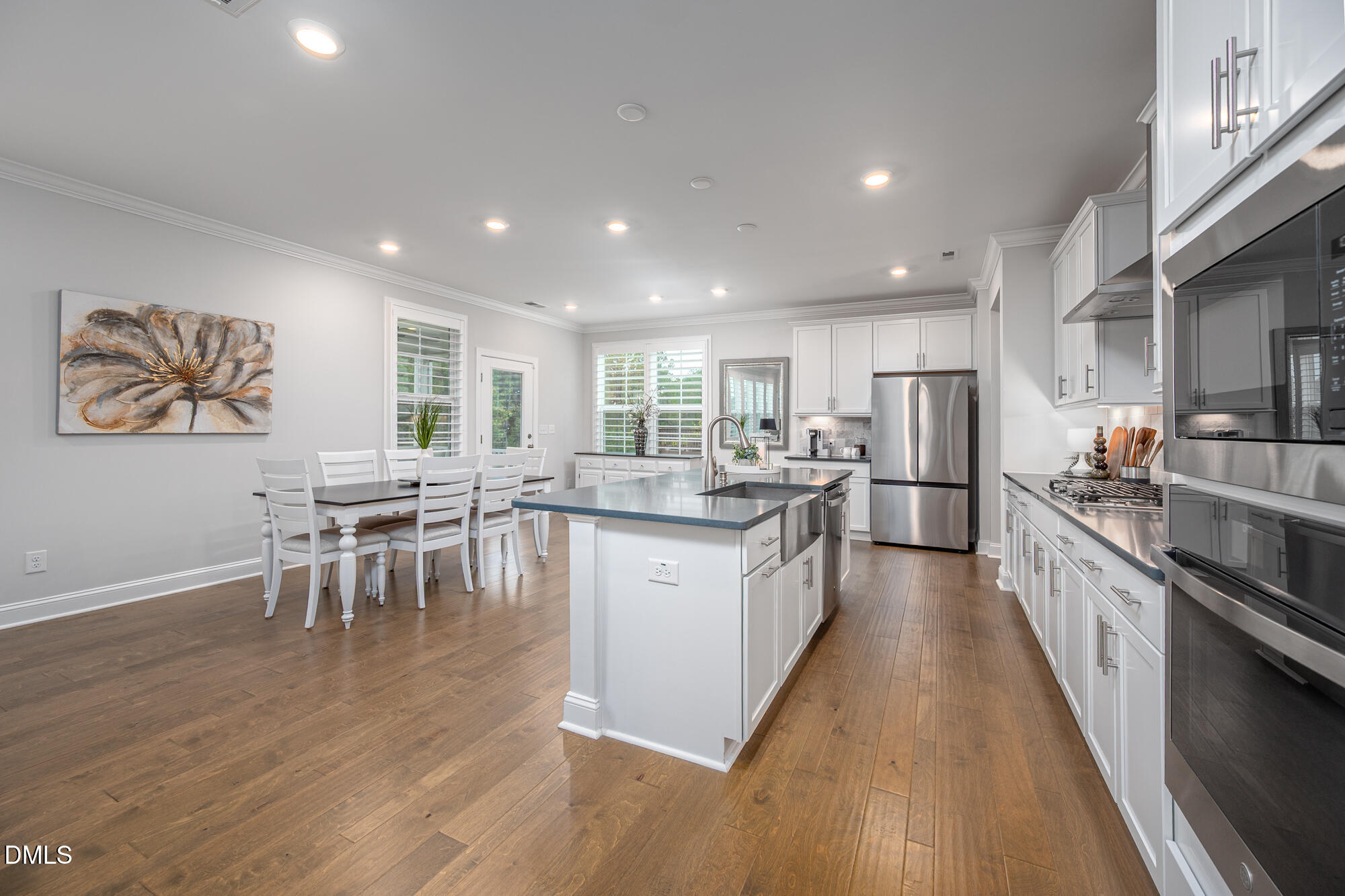 319 High Woods Ridge Chapel Hill, NC 27517 - Photo 18 of 71 a large kitchen with lots of counter space a sink and stainless steel appliances