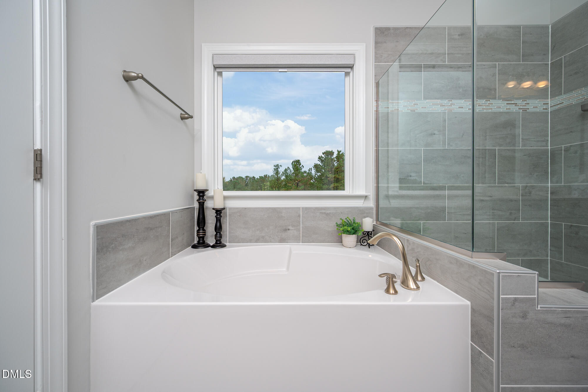 319 High Woods Ridge Chapel Hill, NC 27517 - Photo 27 of 71 a white bath tub sitting next to a shower