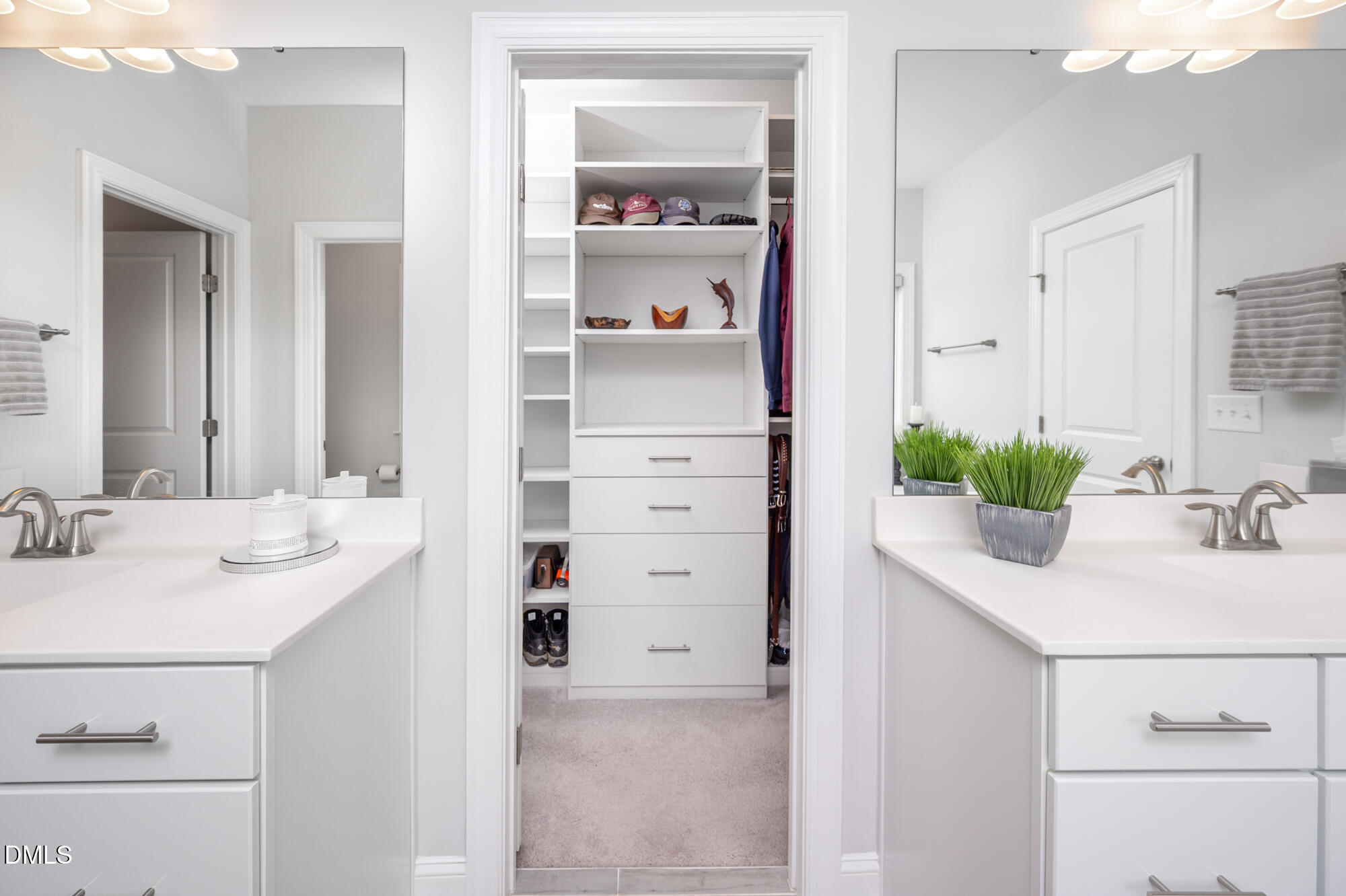 319 High Woods Ridge Chapel Hill, NC 27517 - Photo 28 of 71 a bathroom with a sink and a mirror